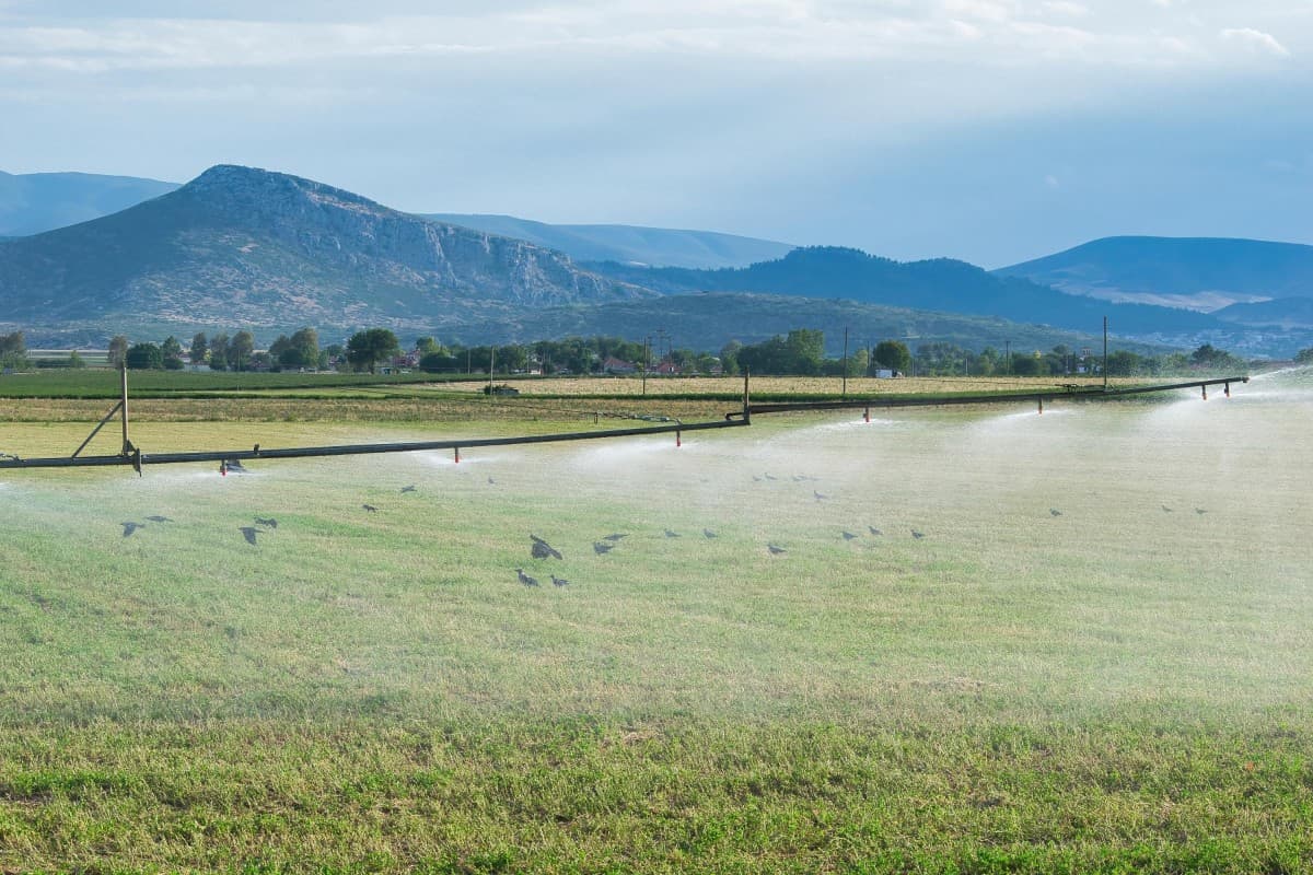 Solar panels against power plant